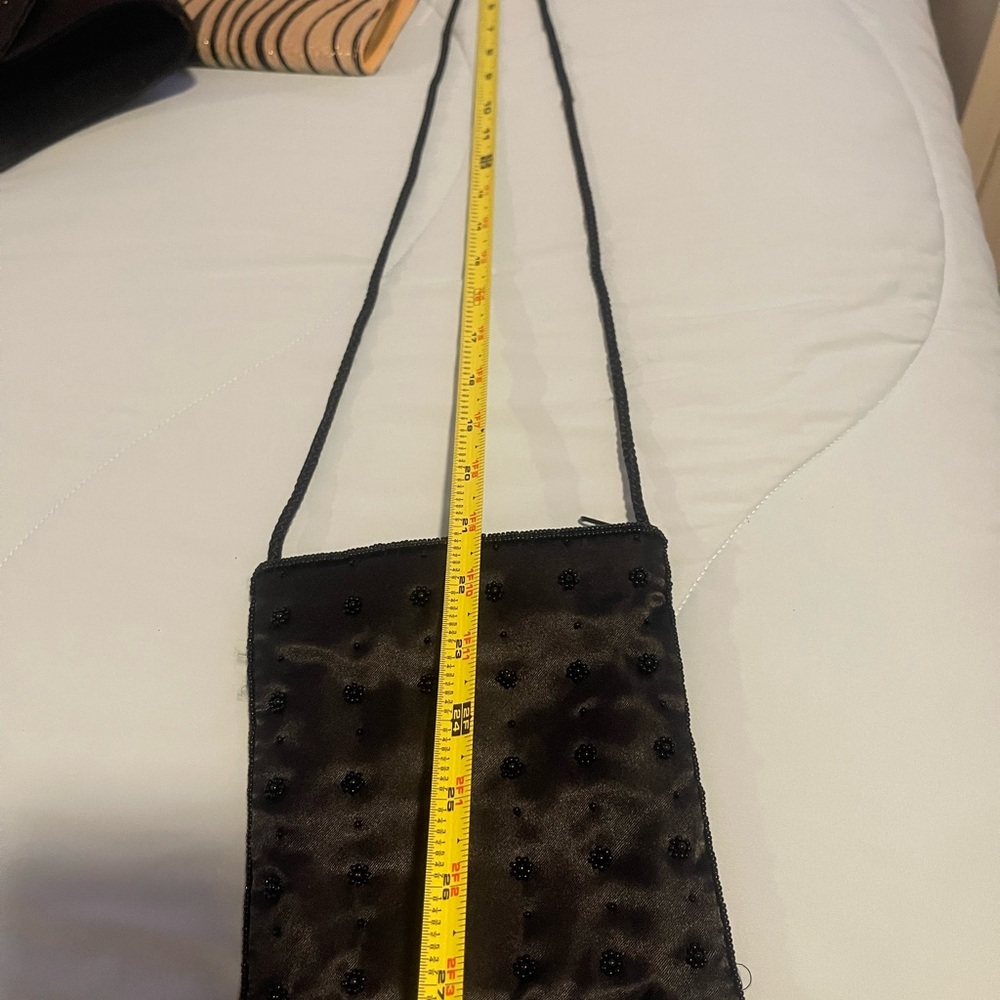 Satin beaded crossbody black purse.Zip closure. 6”x6”x1”  and 21” Handle - Picture 9 of 9